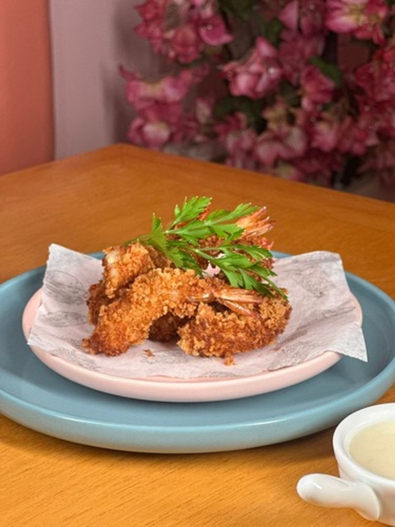 Camarões empanados (porção com 6)